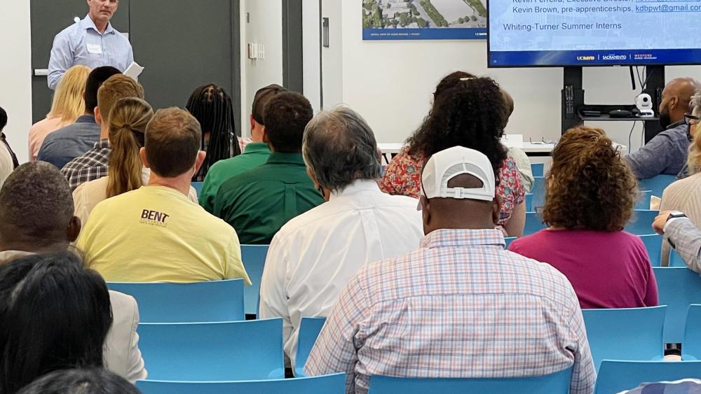 Shawn Cooper, senior project manager at Whiting-Turner, shared information about how subcontractors and local vendors can provide services.