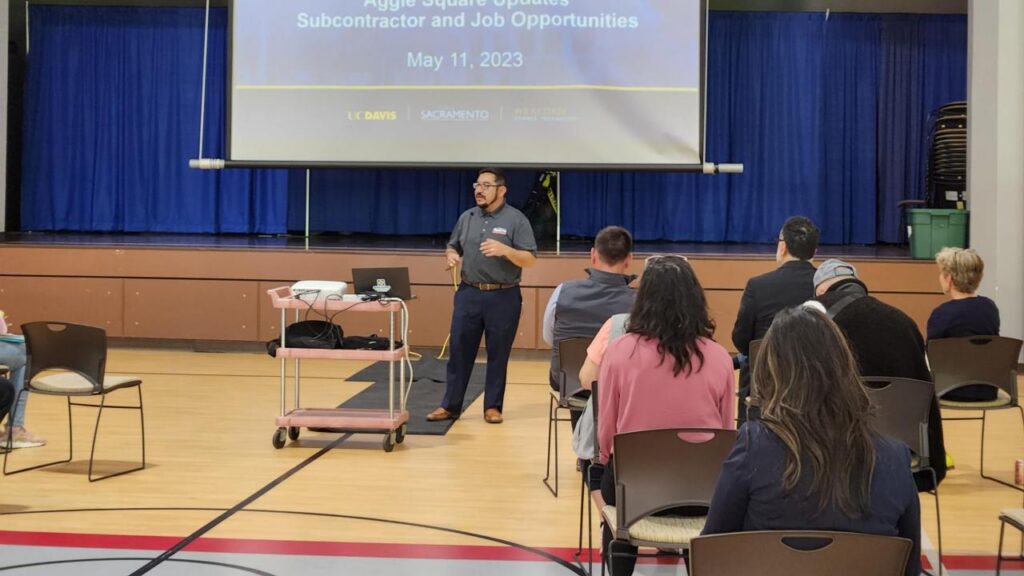 community engagement speaker presenting to crowd
