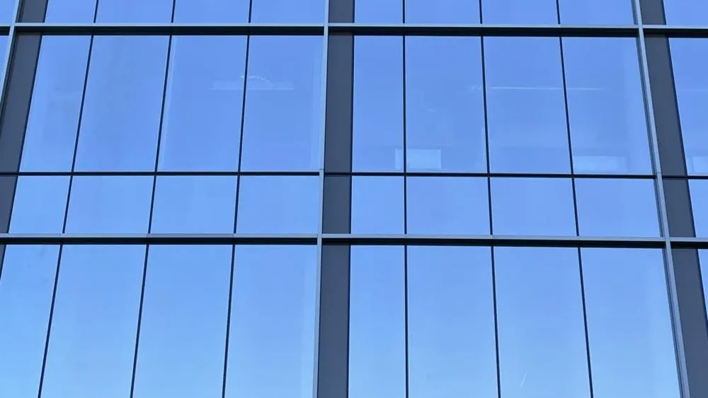 The second-place winner for March 2024 captures a close look at the beautiful exterior glass of 200 Aggie Square. Photo by Jordan Levin.