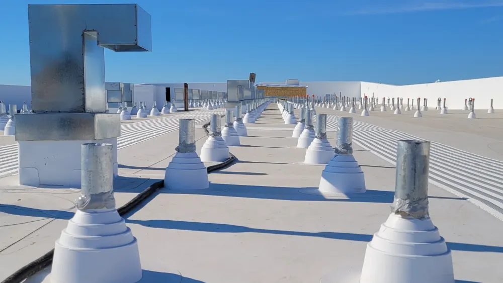 The second-place winner for June 2024 captures the geometry of roof penetrations on the Mixed-Use Residential building. Photo by Bikramdeep Singh.