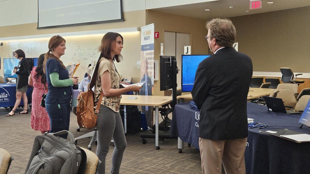 Community members meet representatives from UC Davis Continuing and Professional Education.