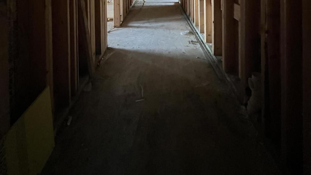 January 2024's second place winner presents an interesting view of the inside of the Mixed-Use Residential building with dramatic lighting. Photo by Mary Mumper.