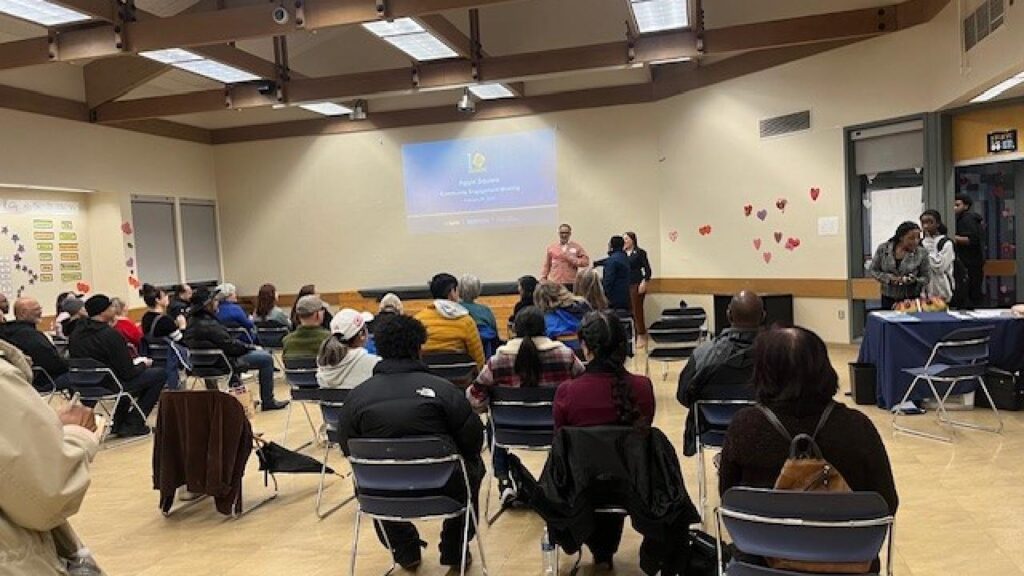speaker presenting to a crowd