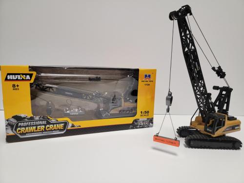 Each student received this die-cast metal crane set as a reminder of the work they witnessed.