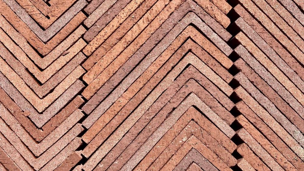 A May 2023 contest winner features bricks used for one of the Aggie Square buildings lined up in a fascinating pattern, appropriately titled 