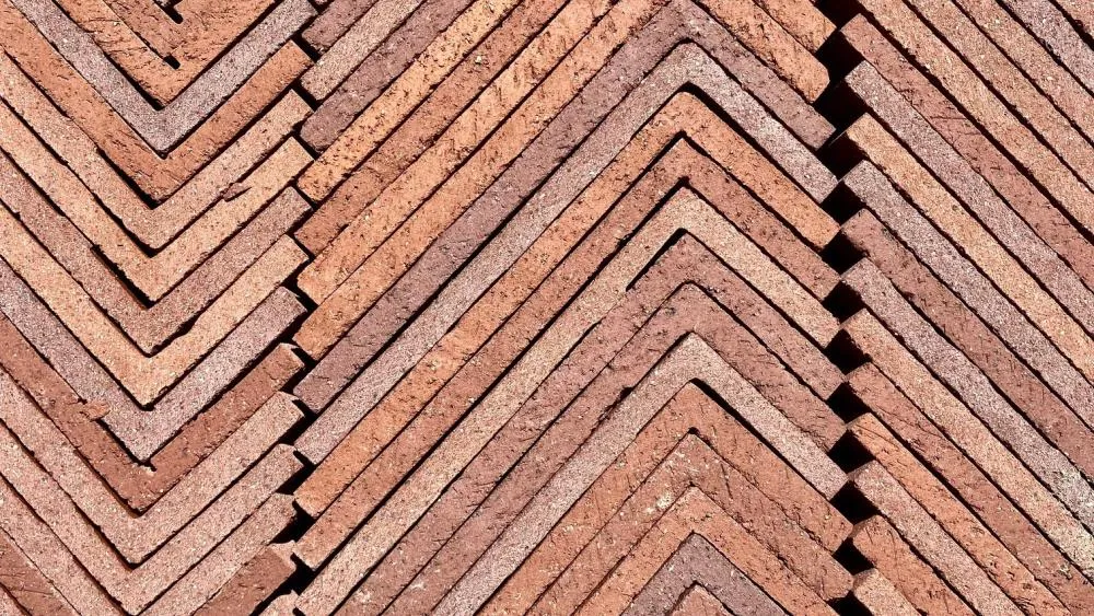 A May 2023 contest winner features bricks used for one of the Aggie Square buildings lined up in a fascinating pattern, appropriately titled 